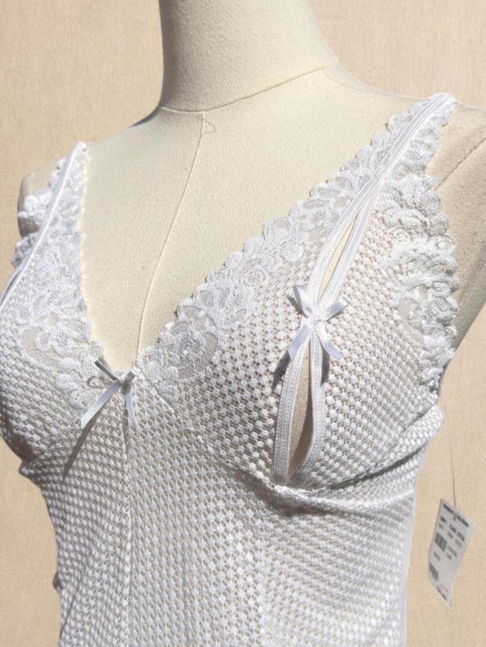 Frederick's of Hollywood white cami top with lace and bow details